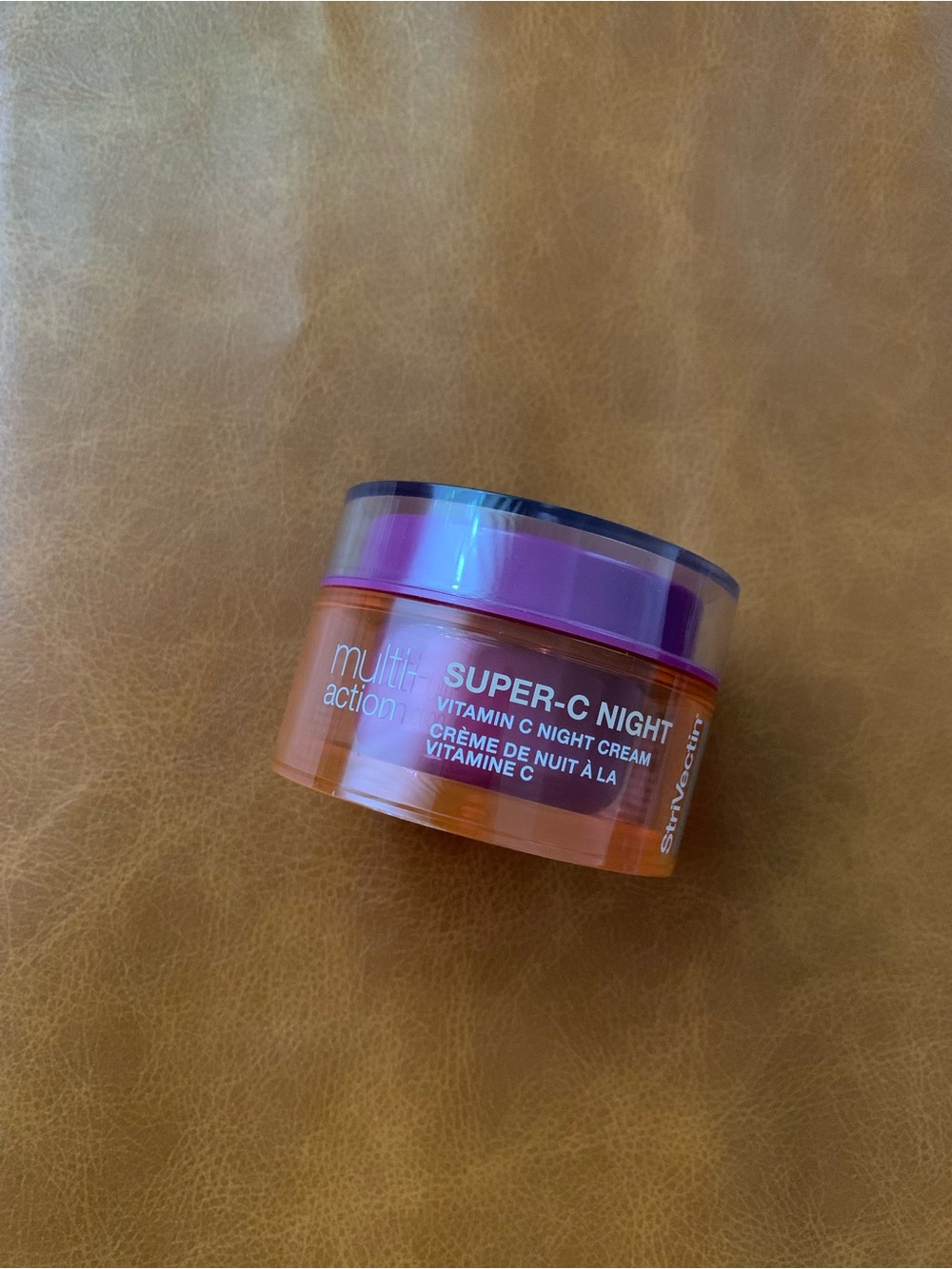 StriVectin Orange Jar with Pink and Purple Lids - Picture 2 of 3